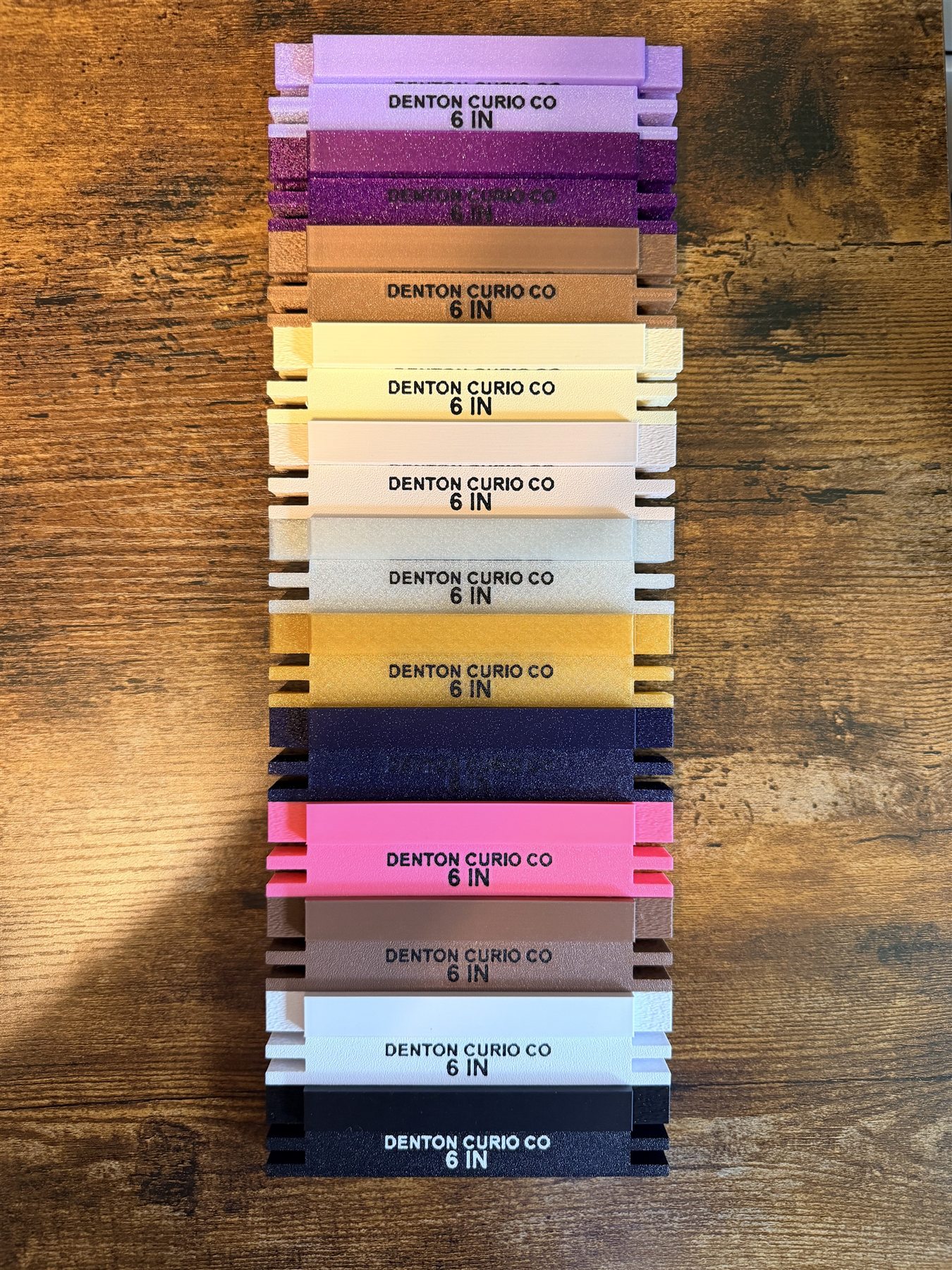 Twelve 6-inch stretcher bar pairs arranged vertically to compare every available color